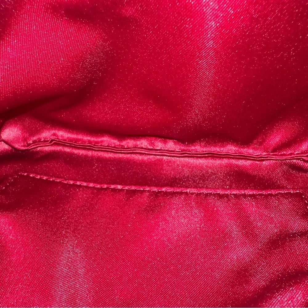 Coach wristlet with pink details! In good condition!
